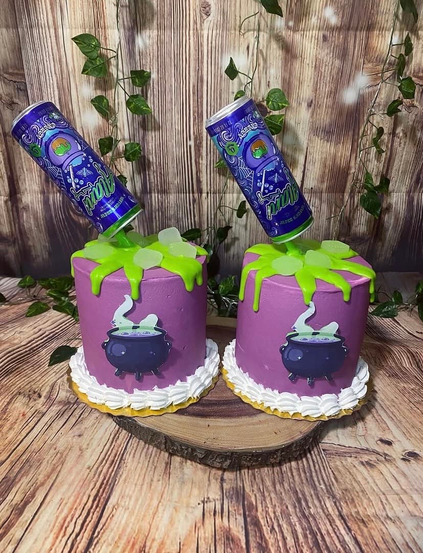 Custom spooky cake by Trista's Treats